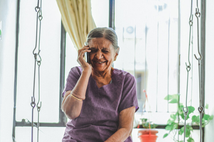 Woman laughing on the phone