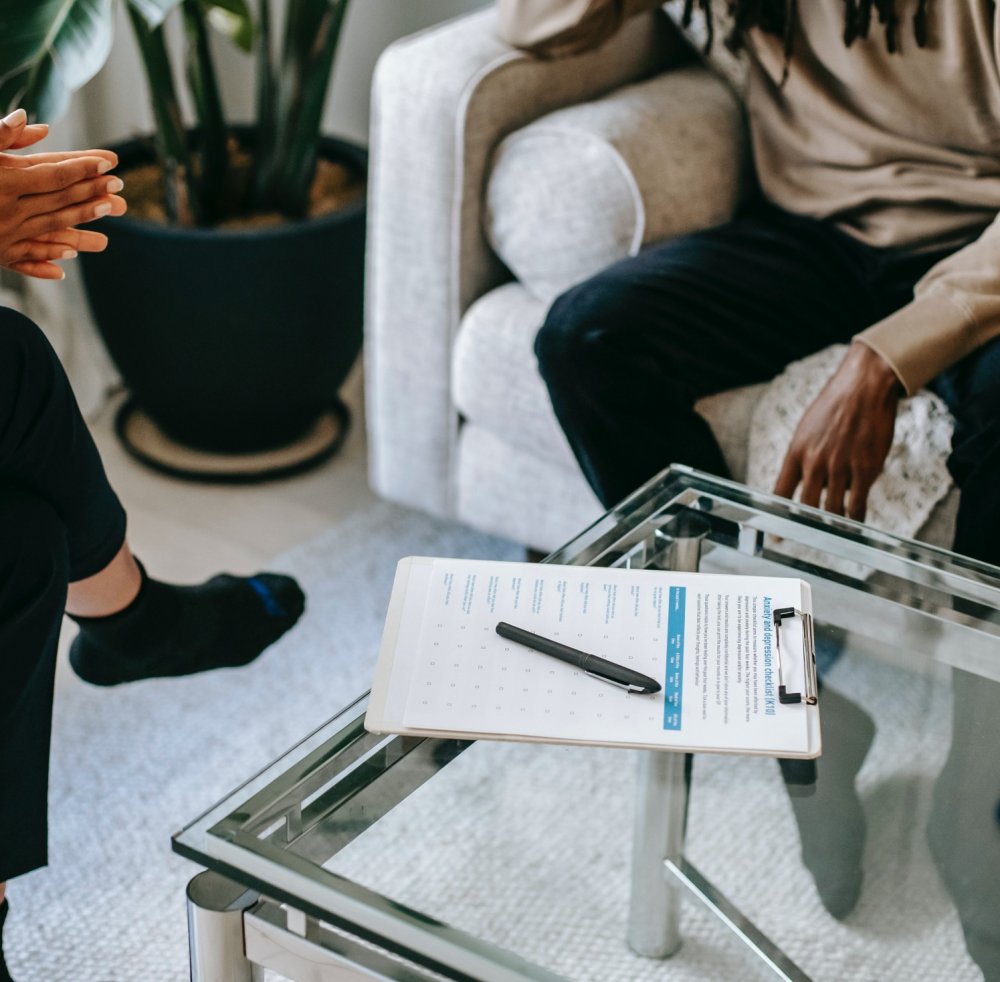 A psychologist performs a mental health evaluation for her client